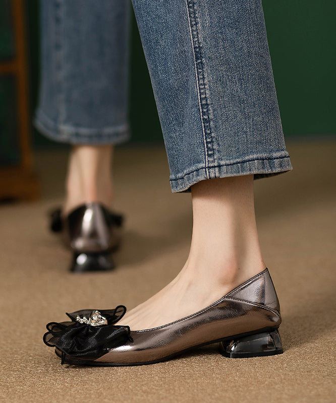 French Bow Splicing Faux Leather Flat Shoes