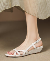 Stylish Hollow Out Splicing Wedge Sandals Black Cowhide Leather