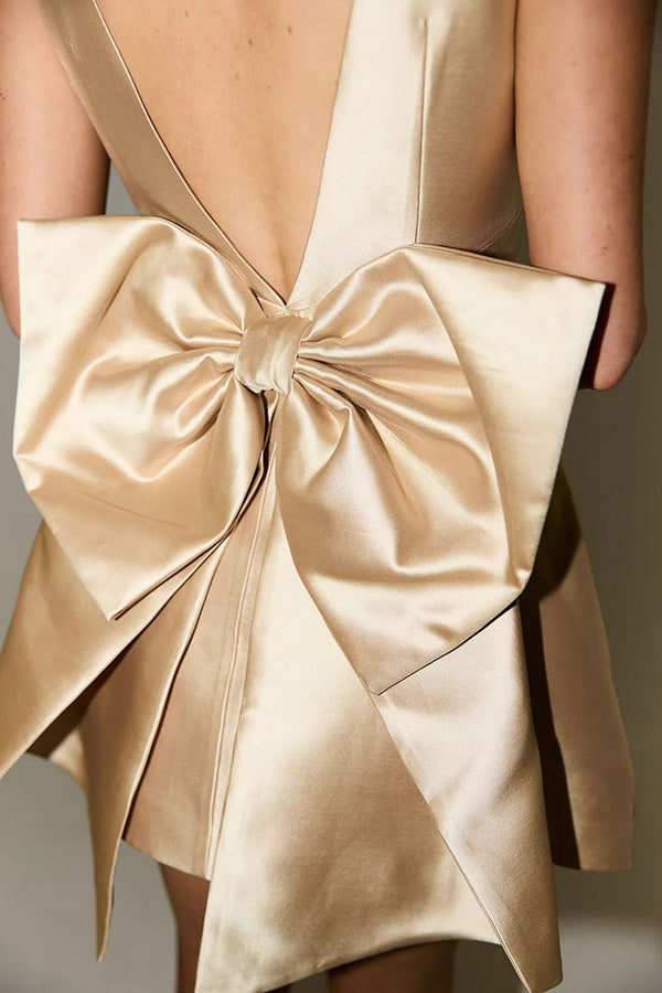 Mini waist cinching satin oversized bow detail square neck mini dress